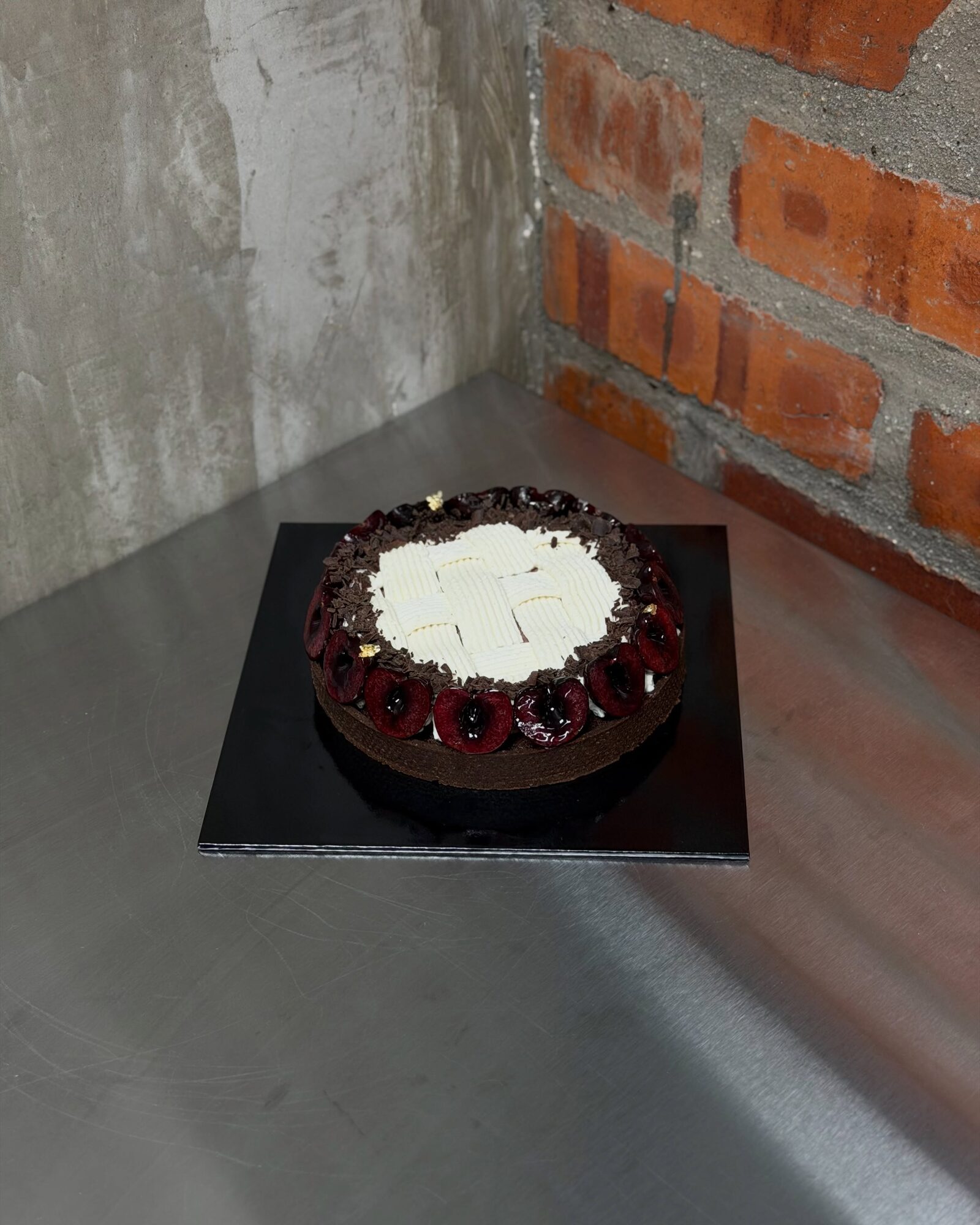 Black Forest Tart on a black cake board